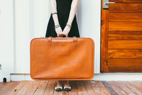 Woman holding luggage