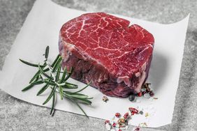 butcher-shopping-tips: marbled piece of steak