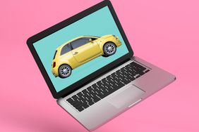 computer with a yellow car on the screen