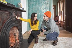 Cheap Old Houses TV Show, checking fireplace