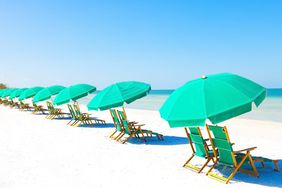Lounge Chairs and Umbrella at the Beach