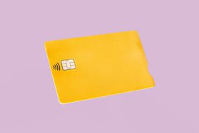 Yellow Credit Card On Pink Background