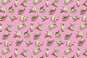 Pattern of crumpled one dollar bills lying against pink background