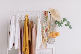 sustainable clothing brands hanging in a closet