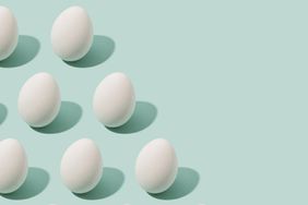 Eggs on blue background, egg shortage 2023