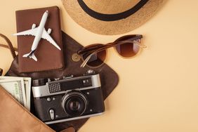hat, camera, passport case