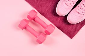 Habits for Breast Health: pink sneakers and hand weights