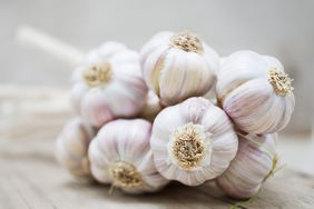 Health Benefits of Garlic: Close up of purple garlic bunch