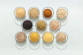 overhead view of multiple glass bowls of grain