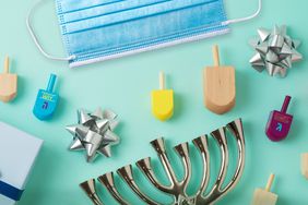 How to celebrate Hanukkah safely during coronavirus - menorah and hanukkah items with mask
