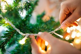 How to put lights on a Christmas tree - tips and guide for hanging tree lights