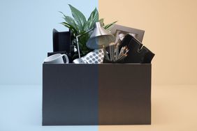 Furlough vs layoff: definition and difference (box of desk belongings)