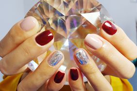 manifesting-using-nail-polish-colors-GettyImages-1081735126