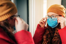 woman wearing glasses and face mask - how to prevent glasses from fogging