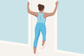 woman stretching in doorway