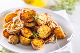 parmesan-potatoes-GettyImages-1423625845