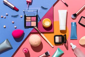Colorful assortment of makeup products and bottles