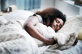 Sleep Quality: woman sleeping in bed