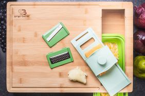 Cutting Board with Collapsible Containers and Graters