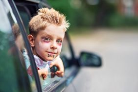 How to celebrate Halloween 2020 during coronavirus: Socially distanced halloween activities, ideas : child with Halloween makeup